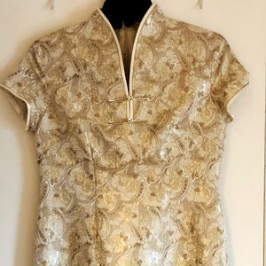 Classic qipao with a new twist, you. Fine workmanship, golden threads and more.